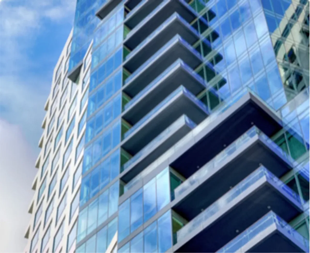 Modern residential high-rise featuring Tecnoglass glass façades, windows, and balcony systems.